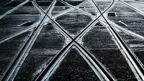 A close up photo of rail tracks.