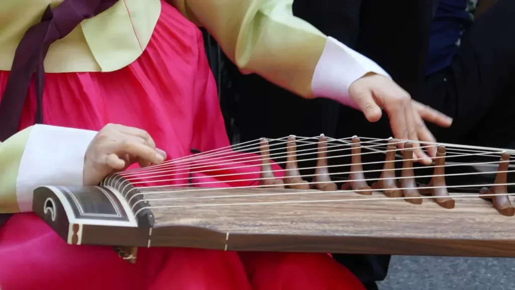 Person playing brown string instrument. Themes of fantasy music.
