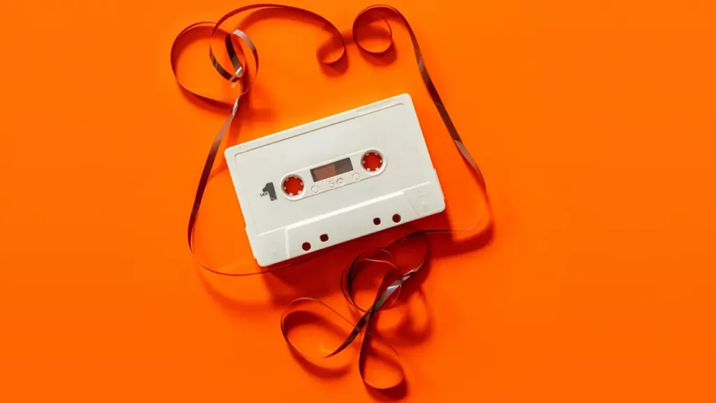 White cassette tape close up photography. Themes of glossary.