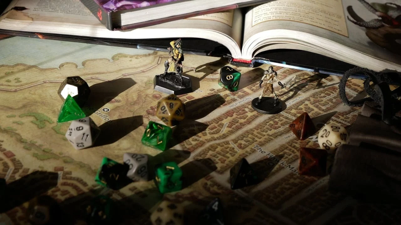 Miniatures and dice on a map and rulebook.